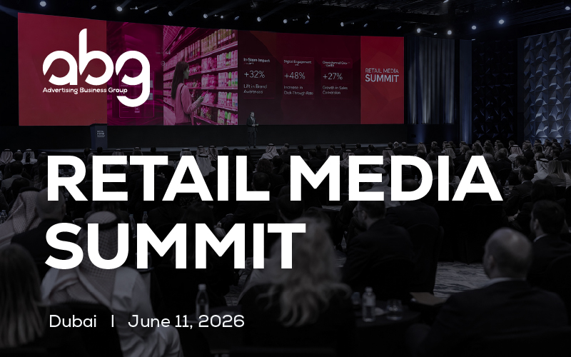 Retail Media Summit conference stage with diverse audience and Middle Eastern business leaders attending presentation